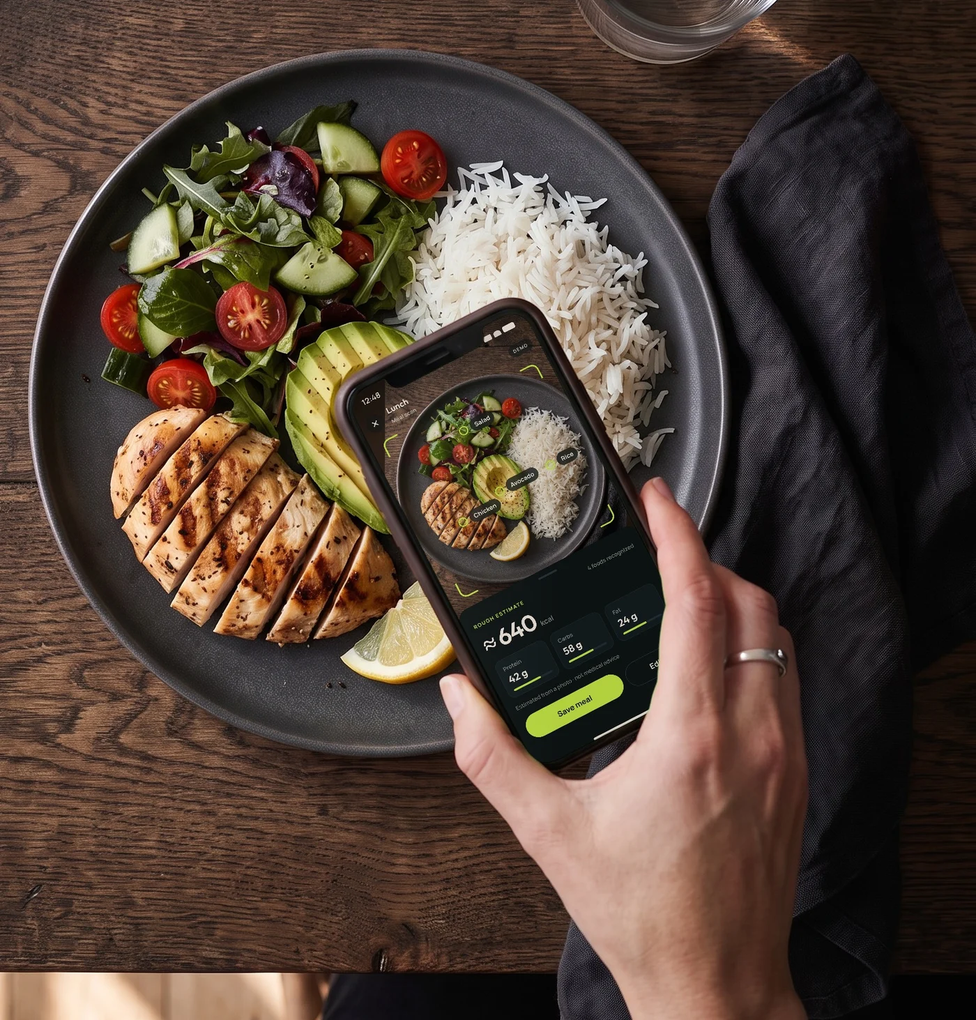 Illustration: a phone above the plate scanning the meal; the screen shows a rough estimate